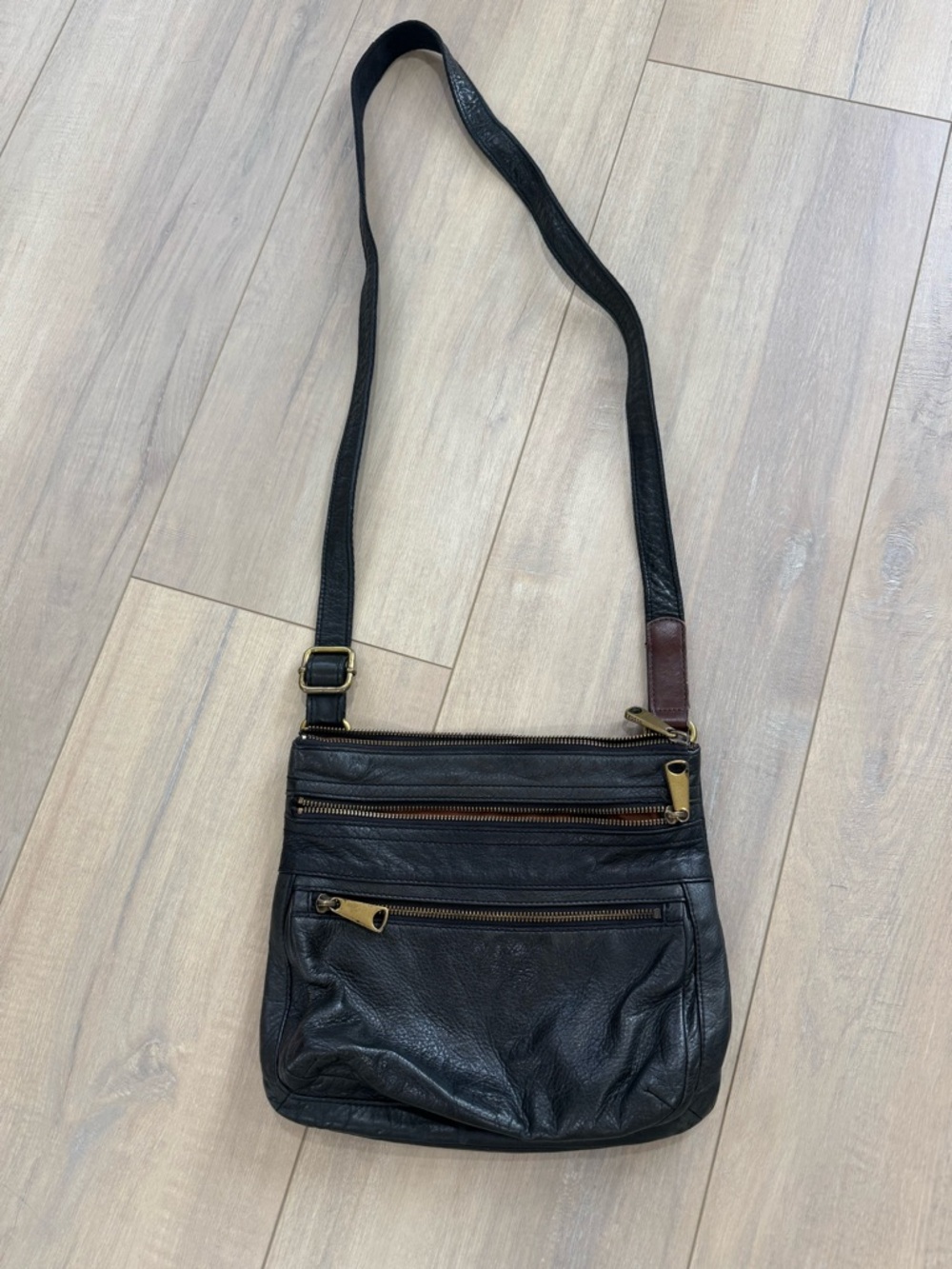 Fossil Black Leather Crossbody with Brass Accents